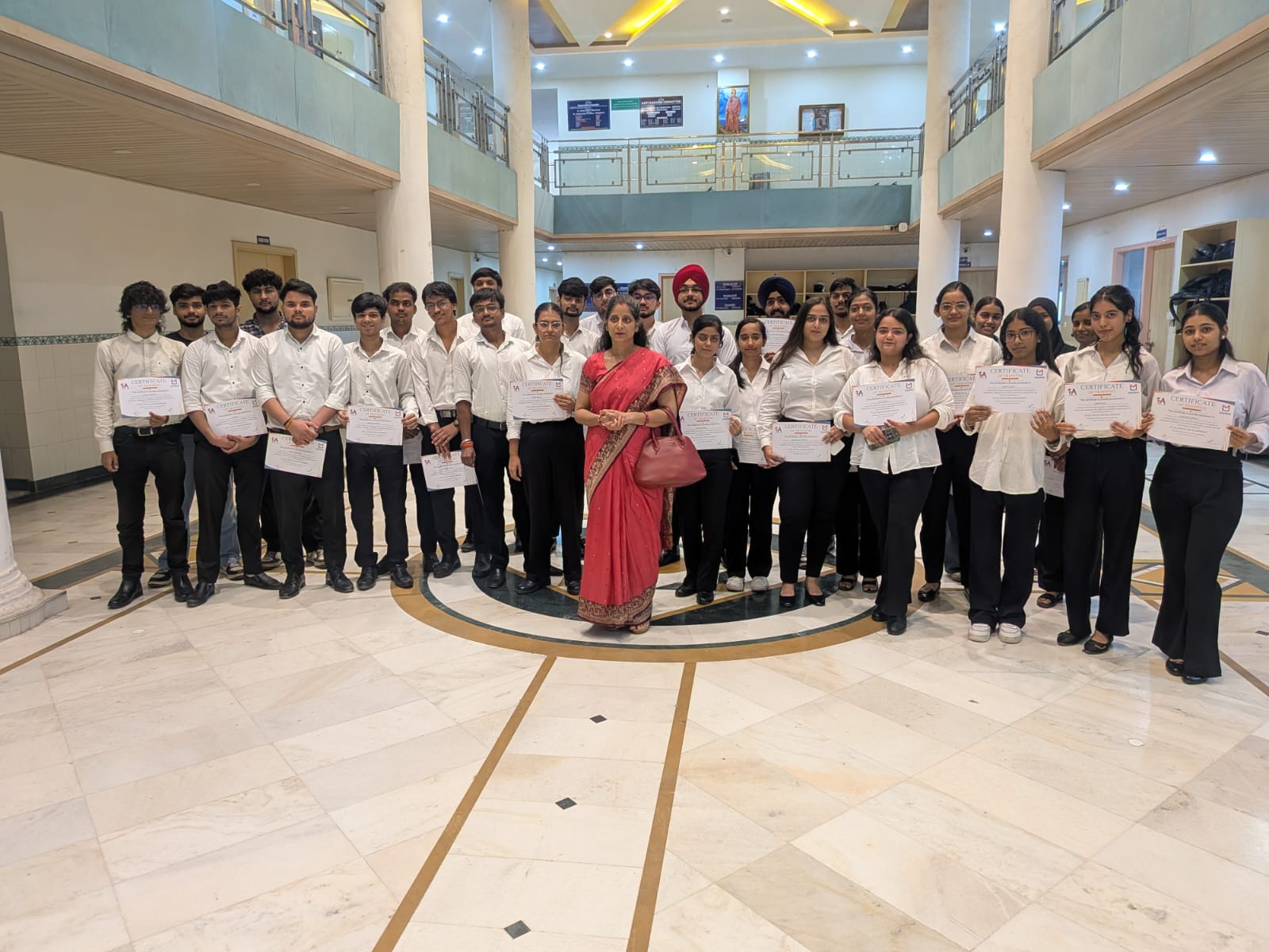 Full batch group photo after Full Stack Development certificate distribution at TuxAcademy